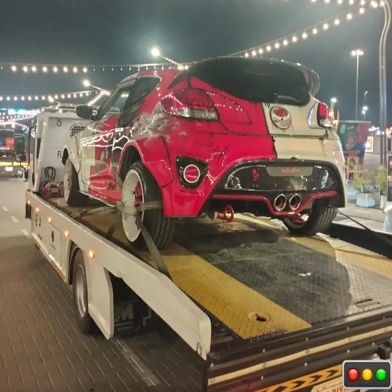 Tow truck assisting a vehicle in Jumeirah